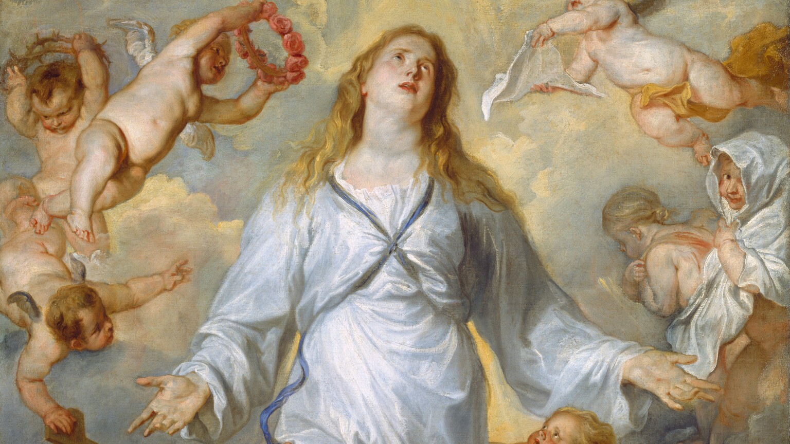 Light pours over a woman floating in front of a bank of clouds, surrounded by ten mostly nude, toddler-like winged putti in this vertical painting. The woman, Mary, and the putti all have pale, peachy skin. Mary's body faces us with her knees bent so her feet are lost in the clouds. She holds both hands out by her sides, palms facing out. Her head is tipped slightly back and to our right, and she looks up with light brown eyes, her pink lips parted. Her golden hair falls loosely in waves to her shoulders. Her pale blue, long-sleeved, voluminous garment is tied with a navy-blue ribbon that crosses her chest between her breasts and is presumably tied across her back. The ten child-like putti have rounded bellies, chubby limbs, and small, gold or silver wings at their shoulder blades. Five putti hover around Mary to each side. To our left, one putto plays with the end of Mary's blue ribbon while below, another holds a wooden cross near the lower left corner of the canvas. The putto holding the cross rests one foot on an iron-gray ball encircled with a gold band and topped with a gold cross. Another putto touches the top of the wooden cross and gestures toward Mary. Near her shoulder, one putto holds a ring of thorns above its head while another raises a ring of pink roses as if to place it on Mary's head. To our right, near Mary's head, a putto holds a piece of cloth like a handkerchief toward her face while one below holds a larger drapery around its head like a hooded cloak as it looks out at us and smiles. The two bottom-most putti hold Mary's fluttering dress and look up at her face. A streak of warm light pours down from the top center, casting yellow light on the tops of the powder-blue clouds.