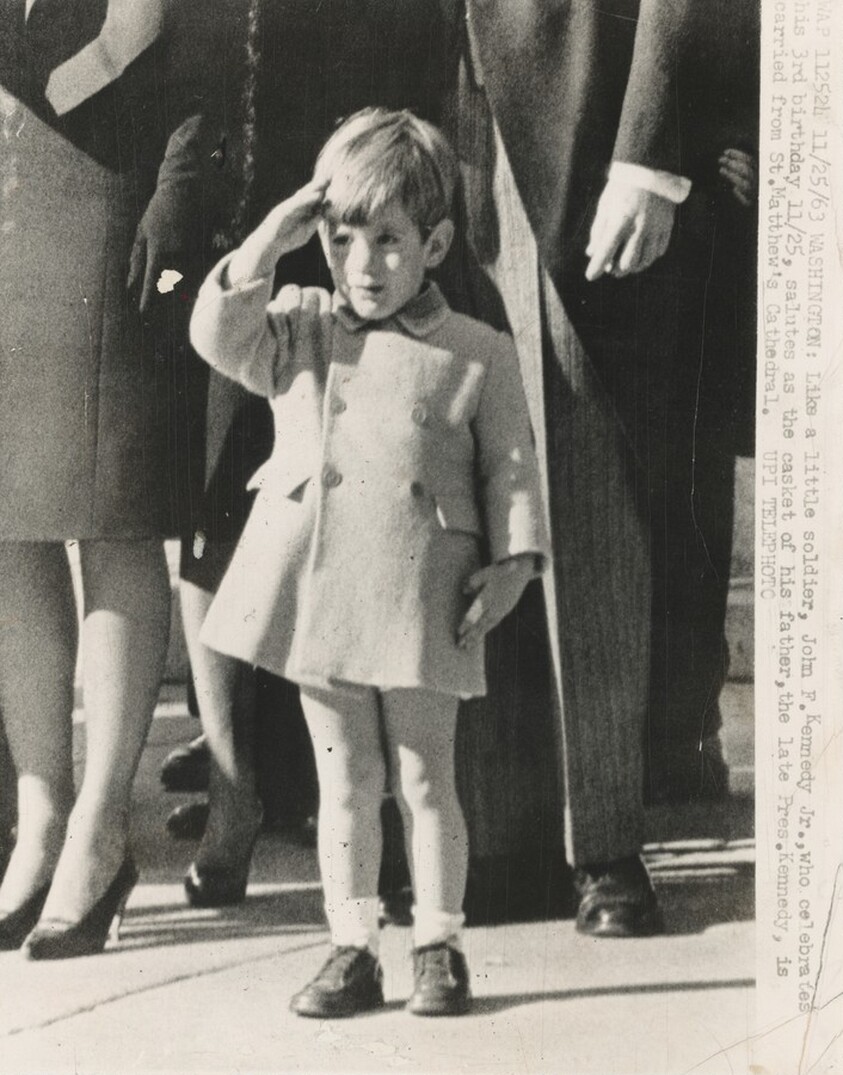 Title from caption on object: “Like a Little Soldier, John F. Kennedy Jr...”