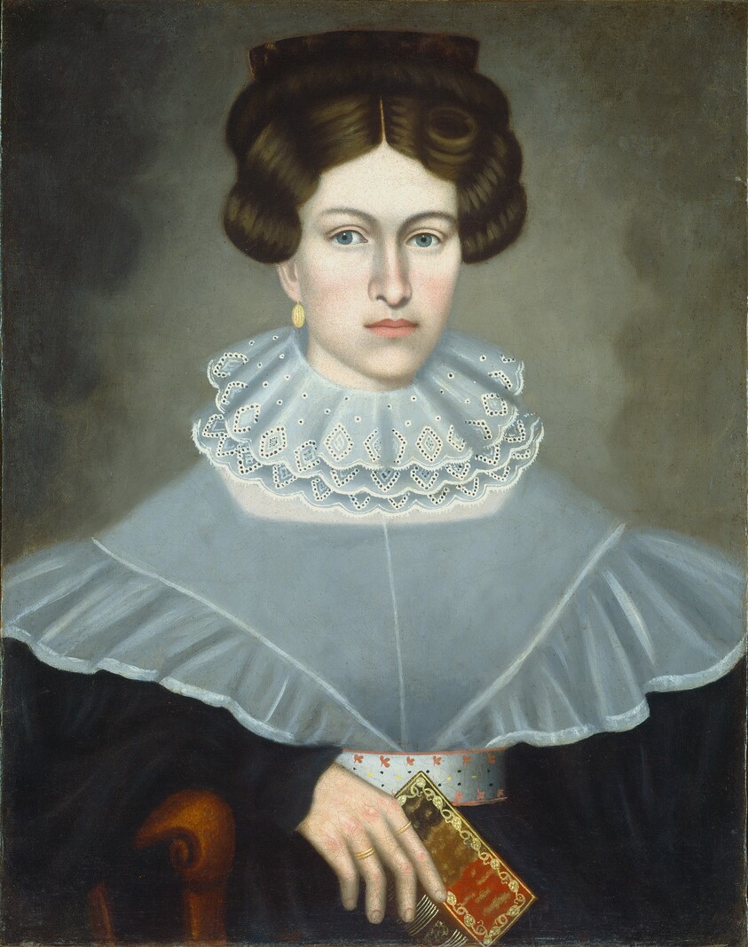 Woman Holding a Book